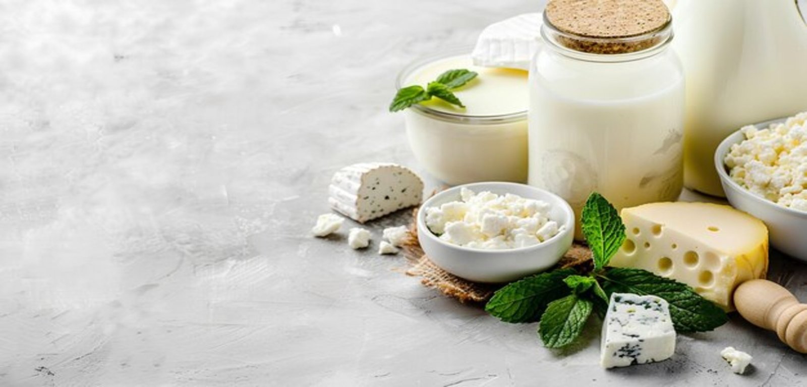 creative-banner-healthy-farm-dairy-products-store-assortment-dairy-products-light-table (1)
