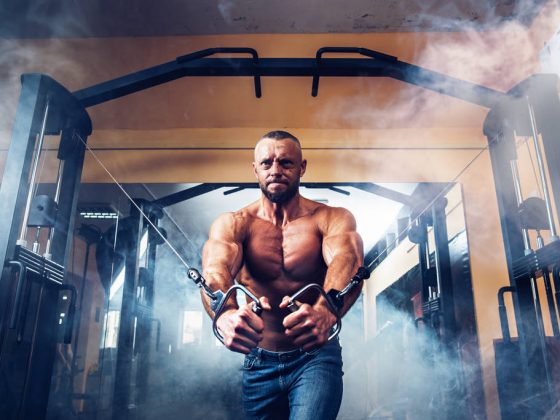 Bodybuilder Is Working On His Chest With Cable Crossover In Gym - gymnyou