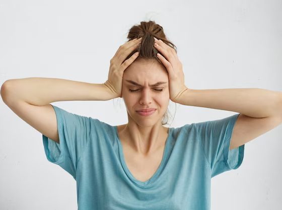 migraines among women head